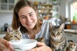 © HendraGalus - Caring pet sitter feeding happy cats in neat and cozy kitchen, for showcasing freelance pet care, part-time pet sitting, and joy of caring pets