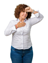 Canvas Print - Beautiful middle ager senior businees woman over isolated background Touching forehead for illness and fever, flu and cold, virus sick