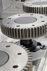 Large gearwheels on a production line conveyor