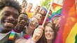 © Carlos Dominique - A group of people are holding rainbow flags and smiling for a photo. Scene is joyful and celebratory, as the group is likely participating in a pride event or rally