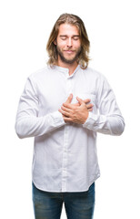 Sticker - Young handsome man with long hair over isolated background smiling with hands on chest with closed eyes and grateful gesture on face. Health concept.