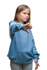 Poster - Young beautiful girl wearing winter sweater over isolated background looking unhappy and angry showing rejection and negative with thumbs down gesture. Bad expression.