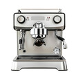 © KanitChurem - A sleek, modern espresso machine with chrome accents, ready to brew the perfect cup of coffee.
