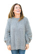 © Krakenimages.com - Beautiful middle age woman wearing winter sweater over isolated background looking away to side with smile on face, natural expression. Laughing confident.