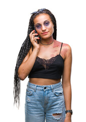 Poster - Young braided hair african american with birth mark talking on smartphone over isolated background with a confident expression on smart face thinking serious