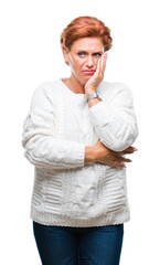 Sticker - Atrractive senior caucasian redhead woman wearing winter sweater over isolated background thinking looking tired and bored with depression problems with crossed arms.