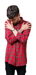 Poster - Young handsome man wearing glasses over isolated background Hugging oneself happy and positive, smiling confident. Self love and self care