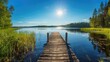 © Vlad - Beautiful Lake in Traditional Finnish and Scandinavian Ambience with Old Wooden Dock on a Sunny Summer Day