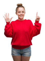 Poster - Young blonde woman wearing bun and red sweater showing and pointing up with fingers number six while smiling confident and happy.