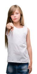 Sticker - Young blonde toddler pointing with finger to the camera and to you, hand sign, positive and confident gesture from the front