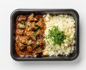 Wall Mural - Beef Stew with Rice in a Black Container