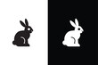 © MONI - Black white side silhouette of a rabbit isolated on white black background.