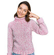 © Krakenimages.com - Young caucasian girl wearing wool winter sweater smiling pointing to head with one finger, great idea or thought, good memory