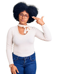 Sticker - Young african american girl wearing casual clothes and glasses shooting and killing oneself pointing hand and fingers to head like gun, suicide gesture.