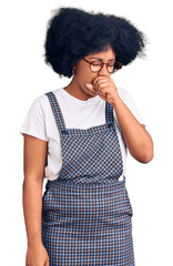 Wall Mural - Young african american girl wearing casual clothes feeling unwell and coughing as symptom for cold or bronchitis. health care concept.