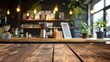 © 2rogan - Blurry background of a coffee shop with an empty wooden table