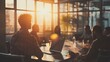 © MP-AI - Silhouettes of a group of people in a modern office,  meeting at a table as the sun sets.