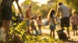 © Justlight - Blurry background of people of all ages pitching in to clean up their neighborhood.