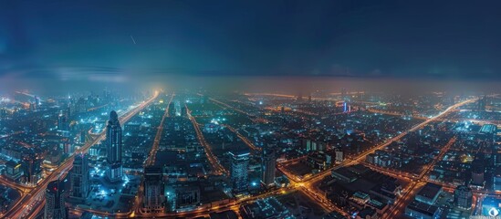 Wall Mural - Nighttime Aerial View of a Cityscape with Illuminated Buildings