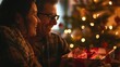 © Maria Mikhaylichenko - Joyful Couple Sharing a Magical Christmas Moment with Sparkling Lights and Festive Gifts, Capturing the Warm Embrace of Holiday Cheer in a Cozy Home Setting