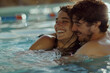 © Nam - a man and a woman are in a pool