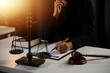 © Phanphen - Law theme, gavel or mallet of the judge, lawyer enforcement officers, evidence-based cases taken into account in the court abount business, legislation.