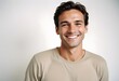 © 月 明 - Positive smiling man on clean background