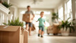 © praewpailyn - Family moving into new home with packed boxes and houseplants, capturing the joy and excitement of new beginnings in a bright and airy living space.