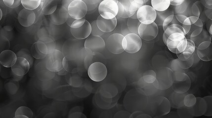 Fototapete - A black and white photo of a blurry background with many circles. The photo has a moody and mysterious feel to it