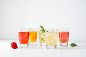 Wall Mural - Refreshing Summer Drinks with Ice and a Strawberry