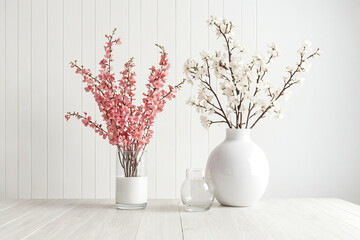 Poster - Minimalist White Background with Pink and White Flowers in Vases