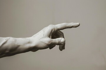 White statue hand with pointing index finger on empty background with copy space