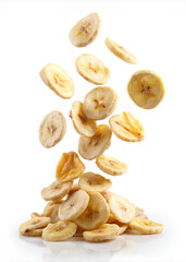 Falling Banana slice chips on isolate white background, clipping path, selective focus