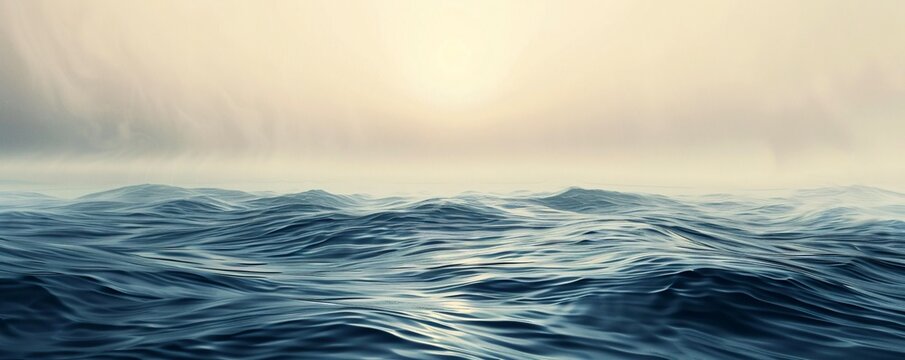 Ocean waves in deep blue roll beneath a cloudy sky as the sun sets on the horizon