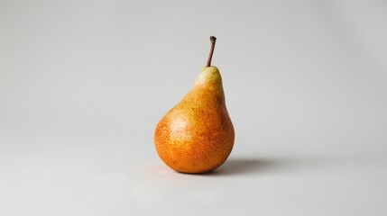 Wall Mural - Studio photoshoot of a single ripe pear on a white background