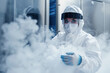 © Degimages - Lab assistant performing cryogenic preservation of biological samples, ultra-cold freezer, safety gear.