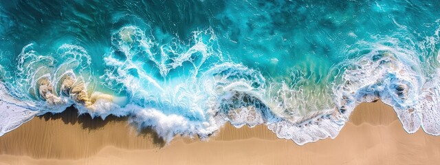 Wall Mural - An aerial view of the marine landscape of waves crashing on a beautiful and breathtaking beach 