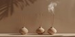 © Grigor - three incense sticks placed on small vases
