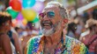 © 路加 石 - A happy old man wearing a rainbow shirt and sunglasses celebrated in a parade as confetti flew around him