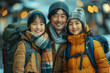 © Kmikhidov - Portrait of Cheerful Asian family, father and his children, in winter clothes and with backpacks on backs are ready for an adventure. Travel and vacation concept