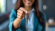 © Ajay - Close up of real estate agent giving keys to client.
