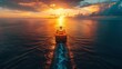 © Barosanu - A container ship navigates towards the sunrise on the open ocean, symbolizing the dawn of new opportunities in global shipping, trade, and maritime advancements.