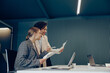 © Kostiantyn - Two smiling business woman work together with documents to get the job done at the office