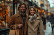 © ivlianna - A stylish couple walking hand in hand with shopping bags in a bustling shopping district .A man and a woman are smiling on a city street, dressed in a jacket and a hat