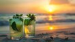 © Nicat - As the sun dipped below the horizon, casting a warm glow across the sandy shore, two refreshing mojito cocktails stood tall.