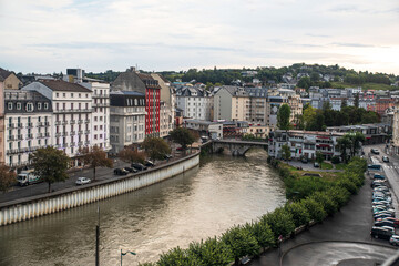 Wall Mural - Facades of buildings in the town of Lourdes in France