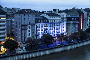 Wall Mural - Facades of buildings in the town of Lourdes in France