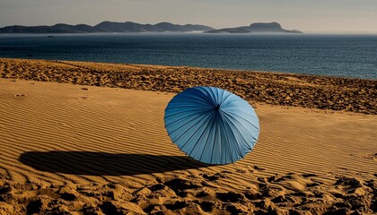 Wall Mural - a blue parasol is stuck in the sand on the beach transparent background and horizon