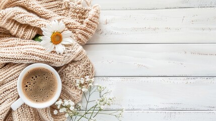 Poster - Cozy Nordic home ambiance with coffee blanket and flower on white wooden surface