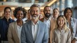 © hisilly - Successful Multiethnic Business Team Smiling in Modern Office Portrait